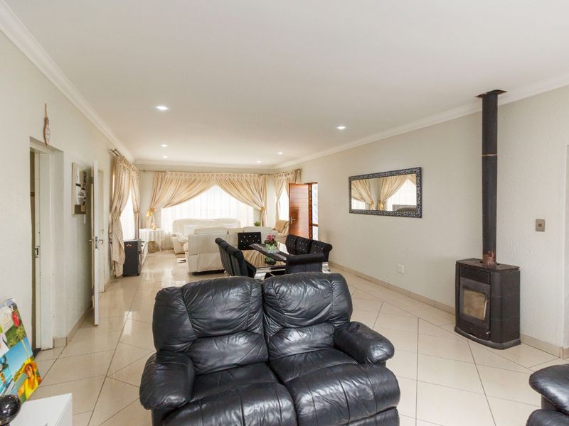 Elegant Family Living with Breathtaking Views in Rangeview - Photo 6