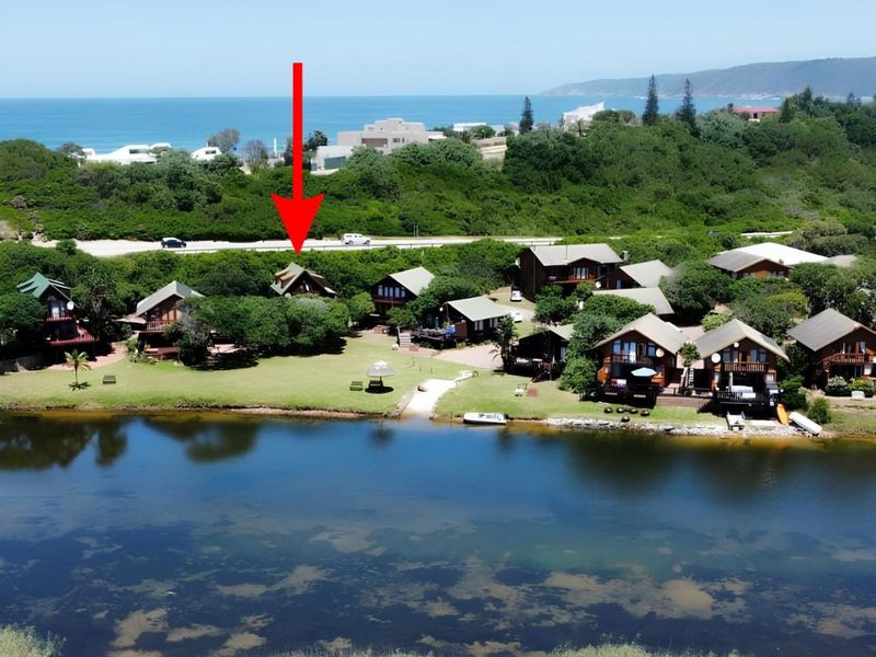 Secure Riverfront home in a lifestyle Resort in Wilderness for sale - Photo 1