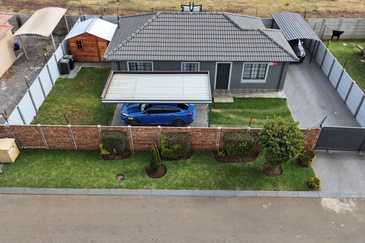 Spacious Sky City Home with Secure Driveway Appeal - Photo 2