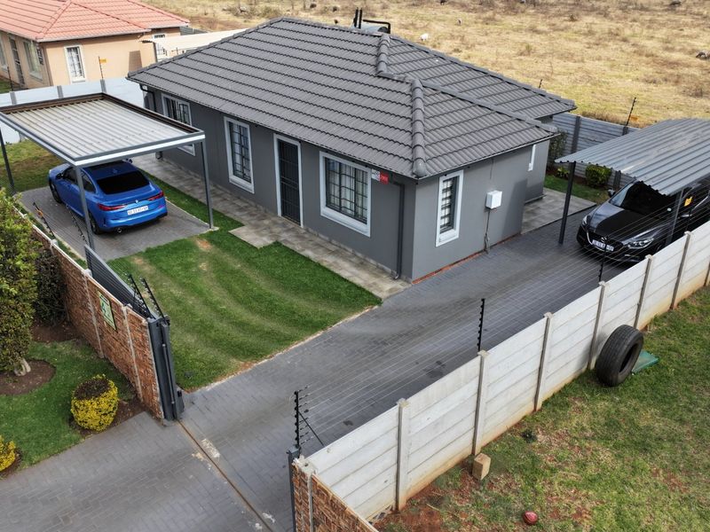 Spacious Sky City Home with Secure Driveway Appeal - Photo 3