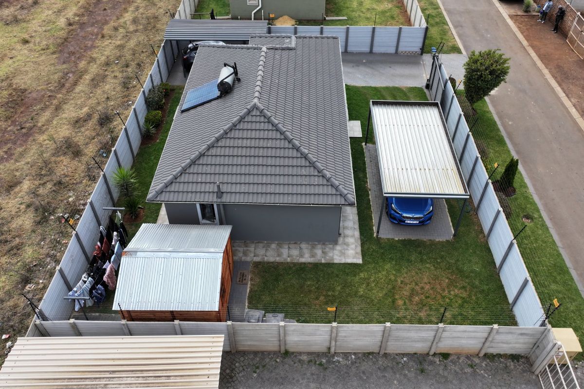 Spacious Sky City Home with Secure Driveway Appeal - Photo 5