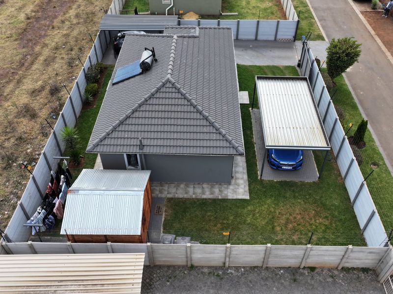 Spacious Sky City Home with Secure Driveway Appeal - Photo 5