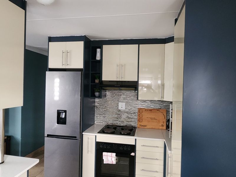 Spacious Sky City Home with Secure Driveway Appeal - Photo 8