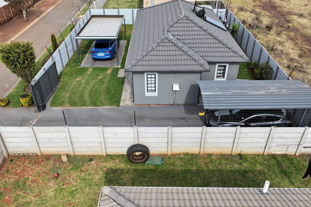 Spacious Sky City Home with Secure Driveway Appeal - Photo 4
