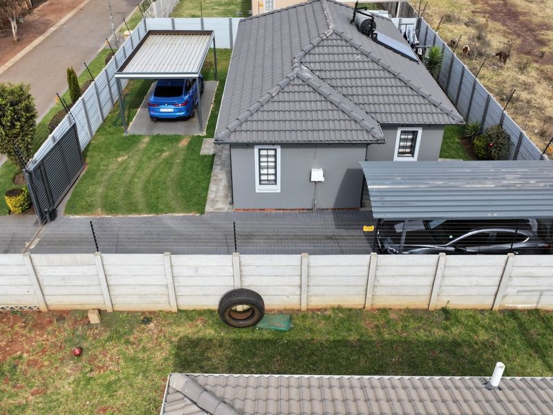 Spacious Sky City Home with Secure Driveway Appeal - Photo 4