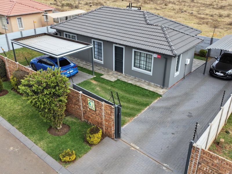 Spacious Sky City Home with Secure Driveway Appeal - Photo 1