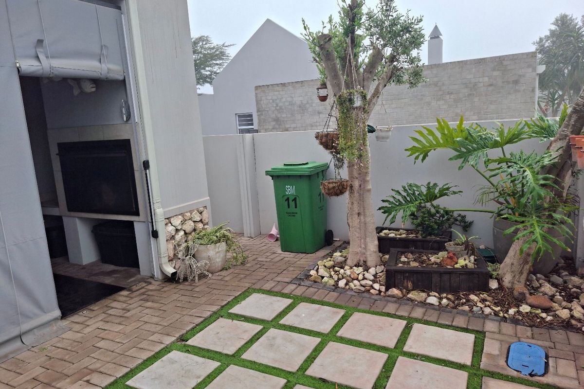 Neat as a Pin with Solar! Perfect Lock-Up-and-Go in Laguna Sands - Photo 2