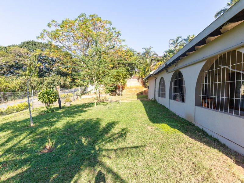 Spacious Family Home With Workshop - Pool & Solar Power & Borehole in Umtentweni - Photo 6