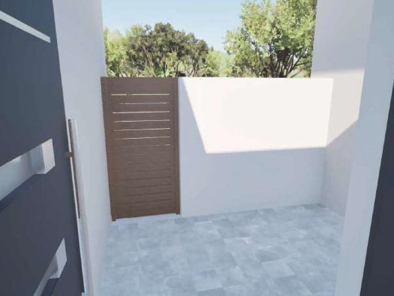 A clean, modern entrance area featuring tiled flooring and a slatted timber gate, providing a secure and minimalist transition into the property.