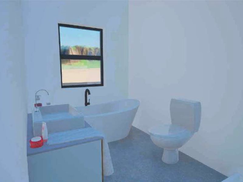 A modern bathroom featuring a freestanding bathtub, vanity basin, and toilet, presented as a digital rendering.