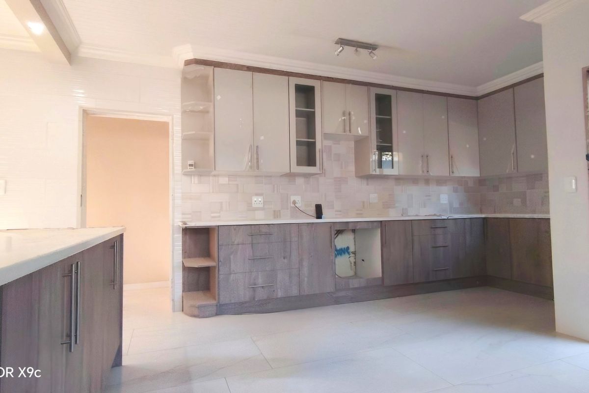 Stylishly renovated family home with pool in sought-After Risiville - Photo 5
