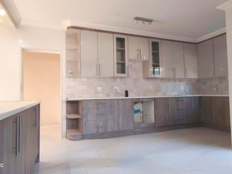 Stylishly renovated family home with pool in sought-After Risiville - Photo 5