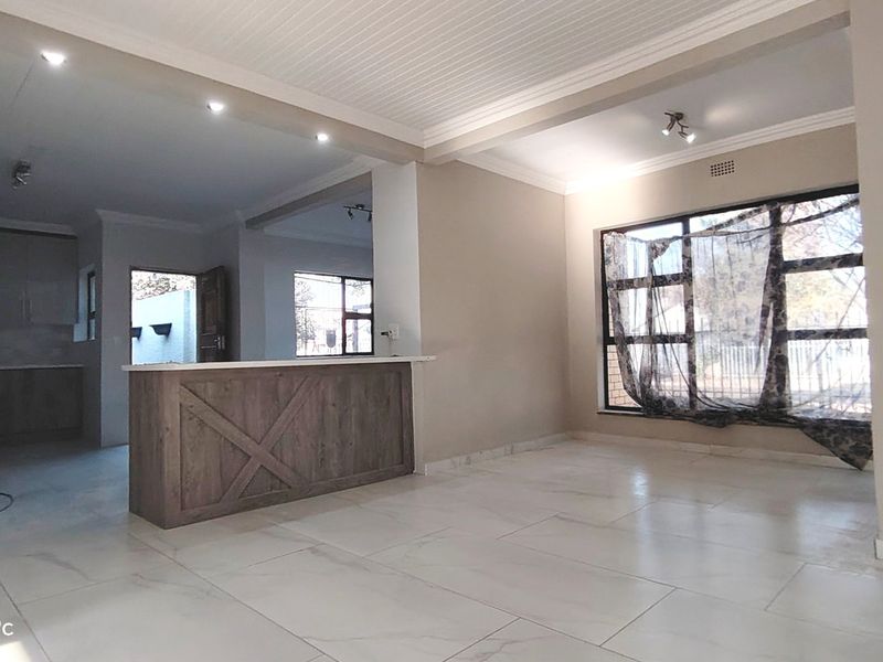 Stylishly renovated family home with pool in sought-After Risiville - Photo 1