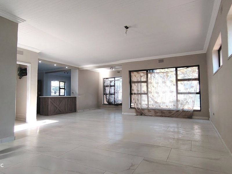 Stylishly renovated family home with pool in sought-After Risiville - Photo 9