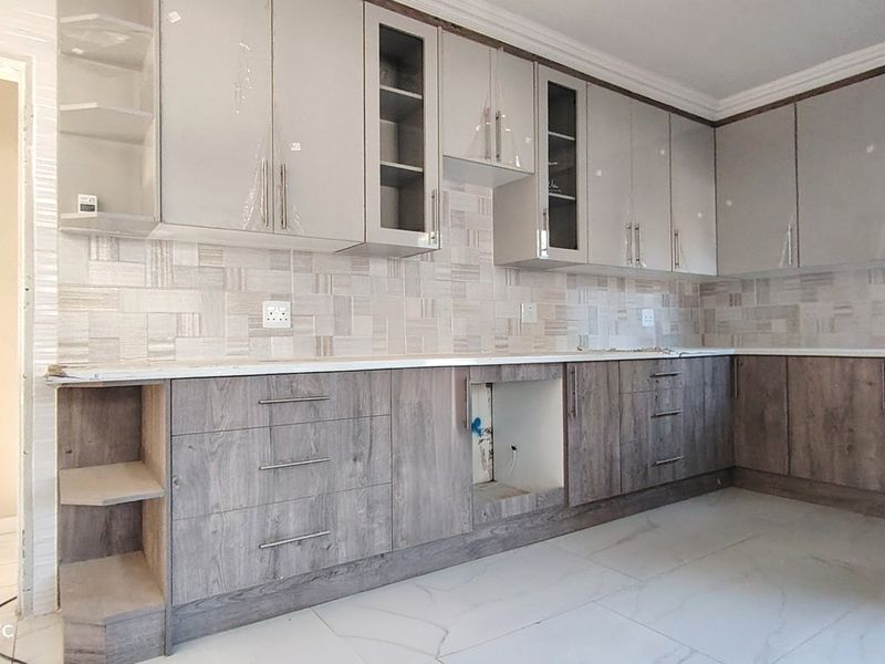Stylishly renovated family home with pool in sought-After Risiville - Photo 6
