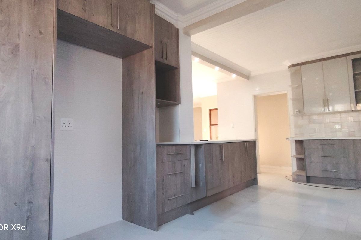 Stylishly renovated family home with pool in sought-After Risiville - Photo 4