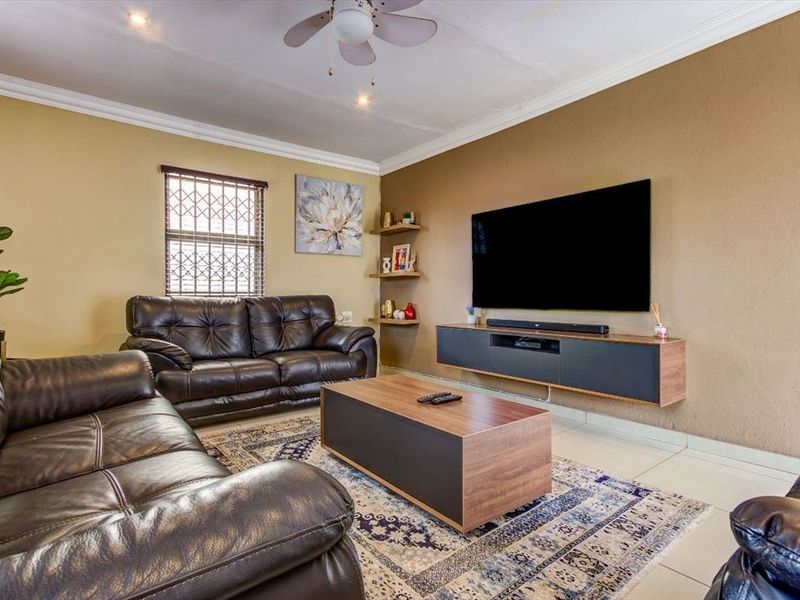 Charming Family Home with Comfortable Living Spaces - Photo 2