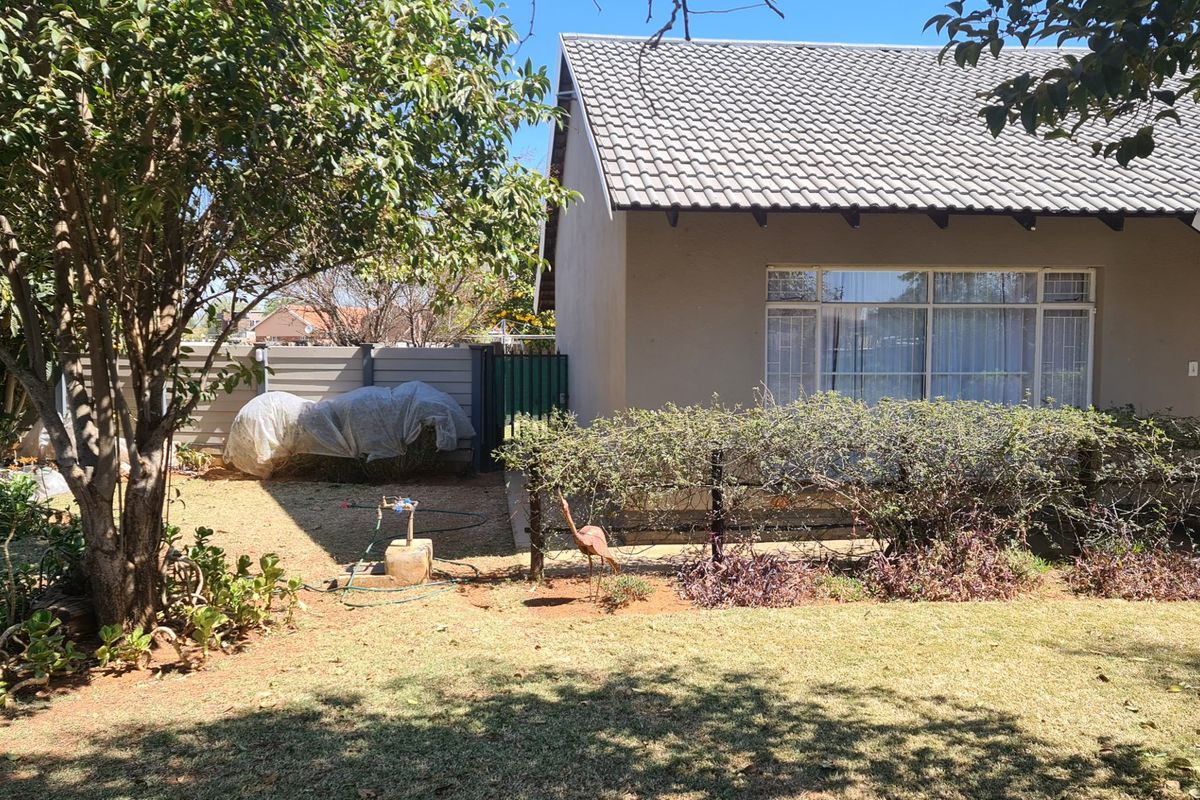 Spacious townhouse superbly situated across from the Shoprite complex in Stilfontein Extension 4. - Photo 3