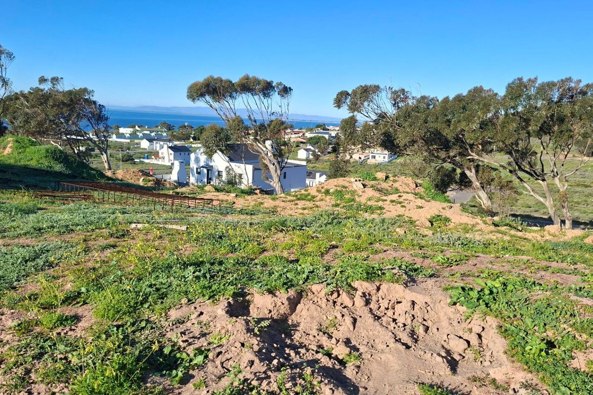 A view of the coastal landscape and surrounding residential area from the vacant residential plot.