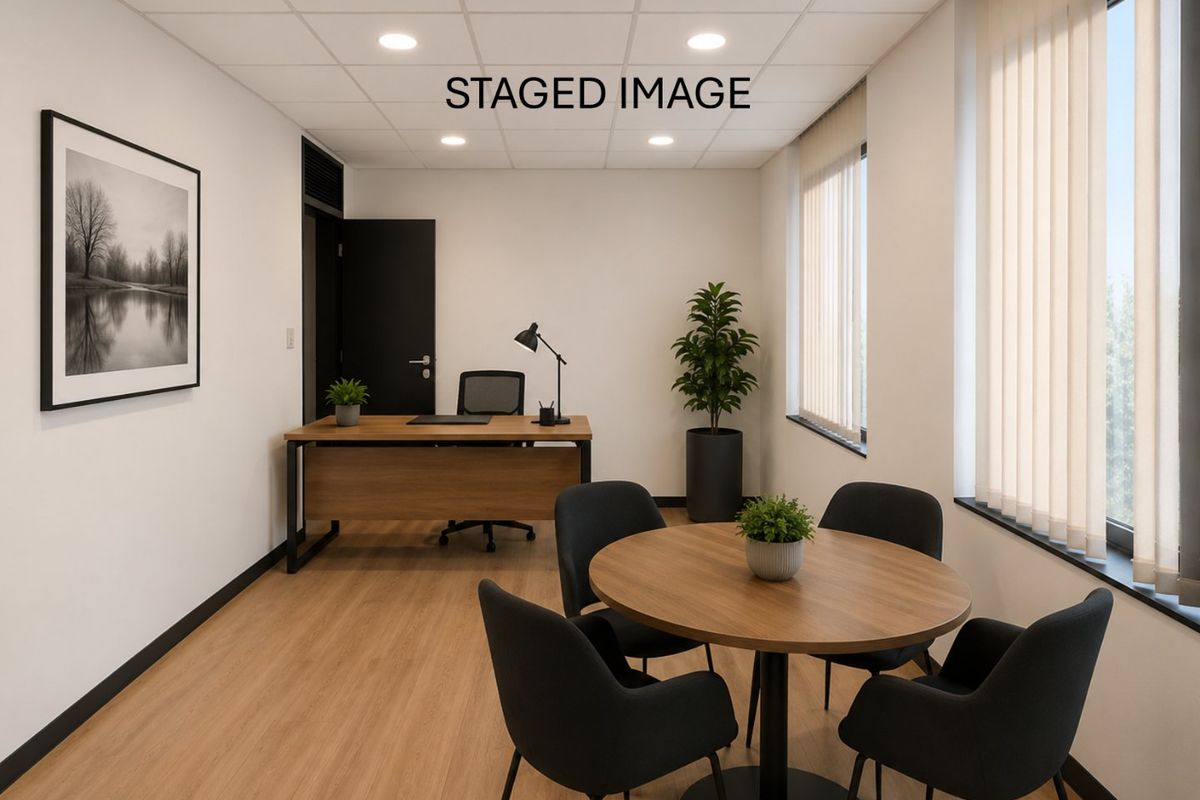 A professional office space featuring a suspended ceiling with recessed lighting, large windows with vertical blinds, and modern laminate flooring.