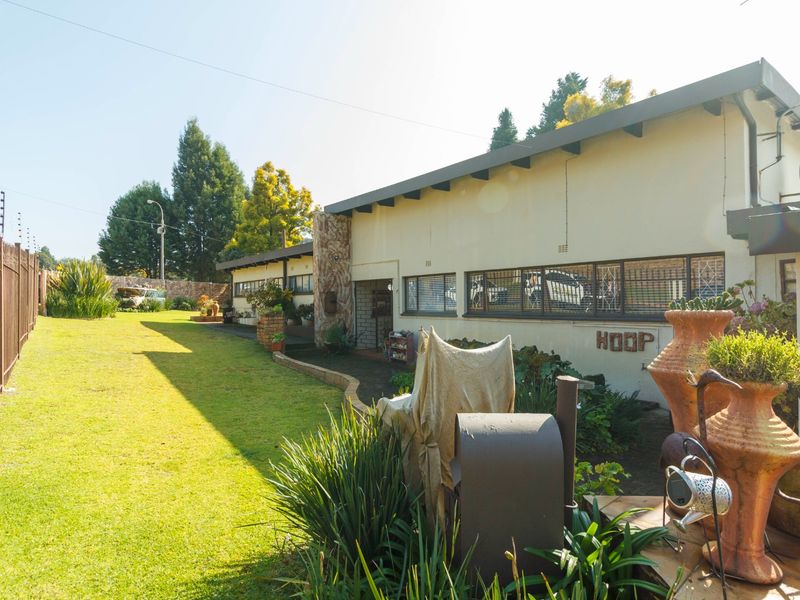 Timeless Family Living with Beautiful Gardens and Exceptional Space - Photo 2