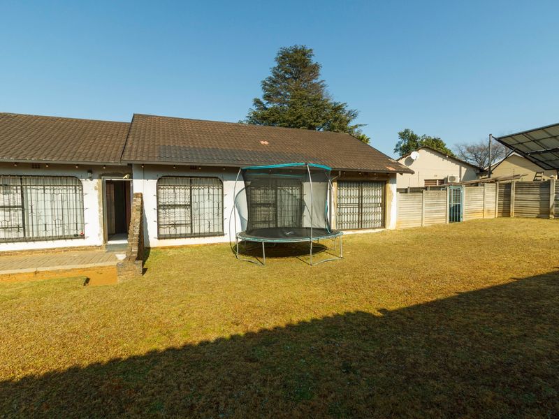 Modern Family Home with Expansive Garden Space in Witpoortjie - Photo 1