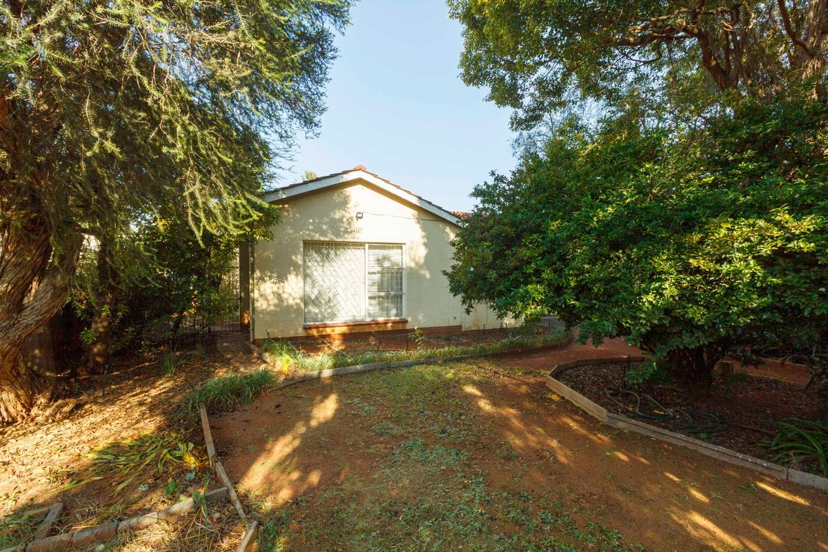 Charming Family Home with Enclosed Veranda and Beautiful Vegetable Garden - Photo 2