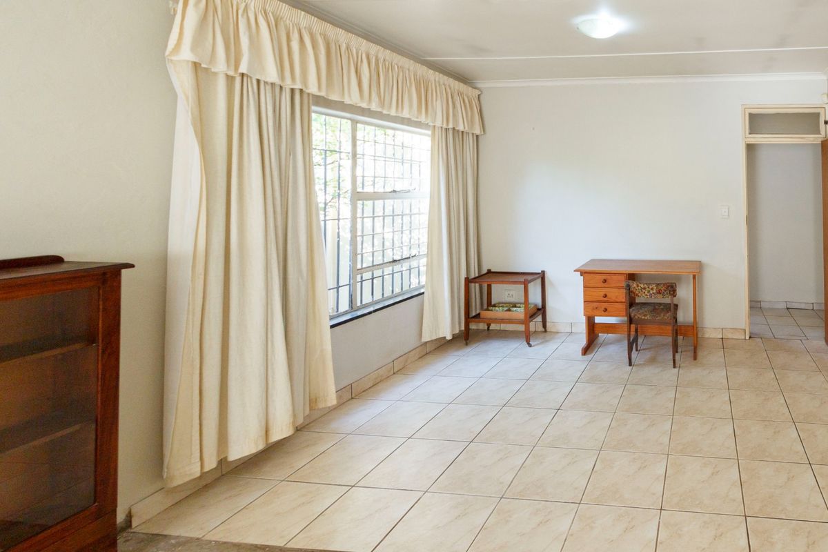 Charming Family Home with Enclosed Veranda and Beautiful Vegetable Garden - Photo 5