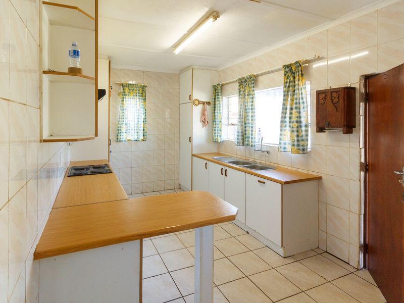 Charming Family Home with Enclosed Veranda and Beautiful Vegetable Garden - Photo 8