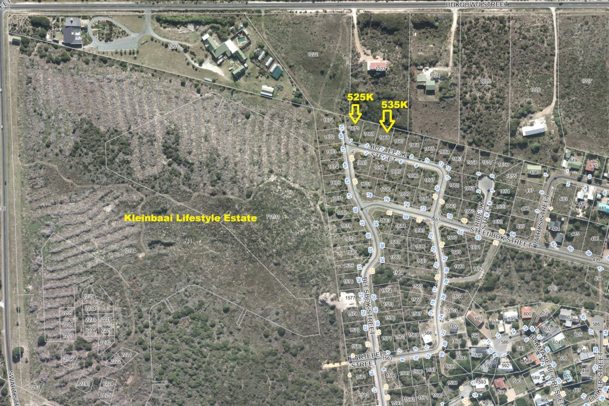 Aerial view of Kleinbaai Lifestyle Estate showing the layout of vacant residential plots and the surrounding street infrastructure.