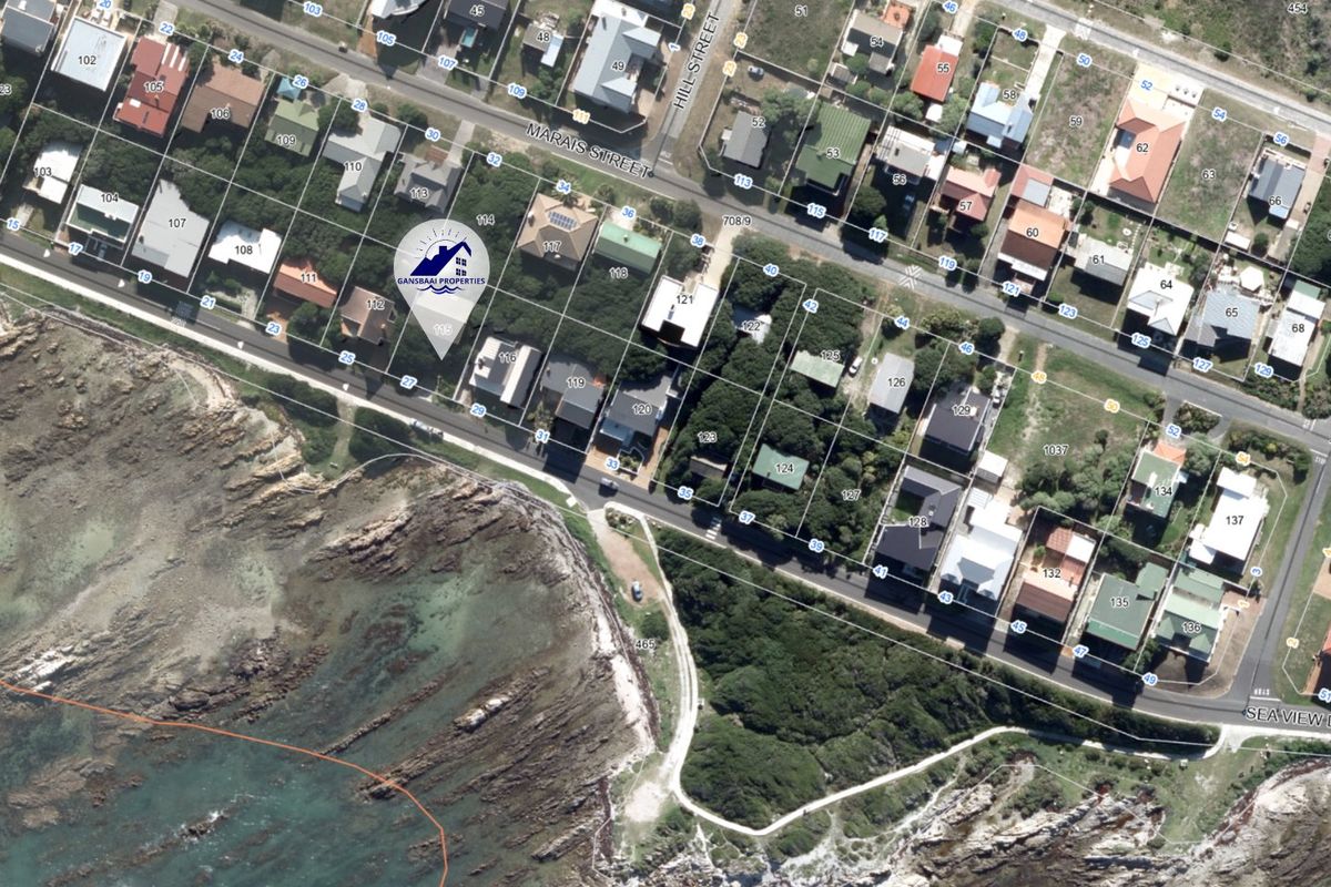 An aerial view of the coastal residential neighborhood showing property boundaries and proximity to the shoreline.