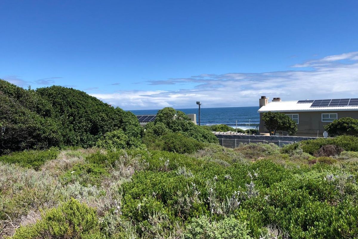 A scenic view of the ocean and coastal landscape from the vacant residential property, showcasing the natural surroundings and proximity to the sea.