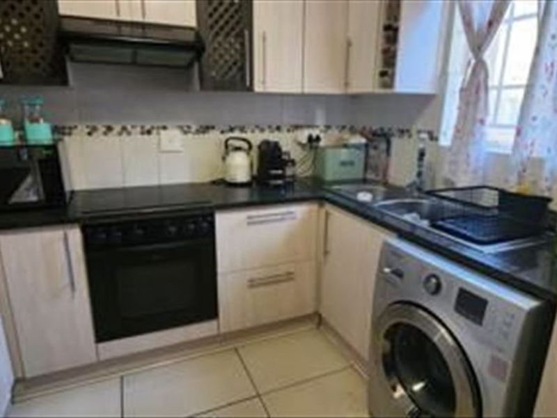 Charming Two Bedroom Home With Pools - Photo 1