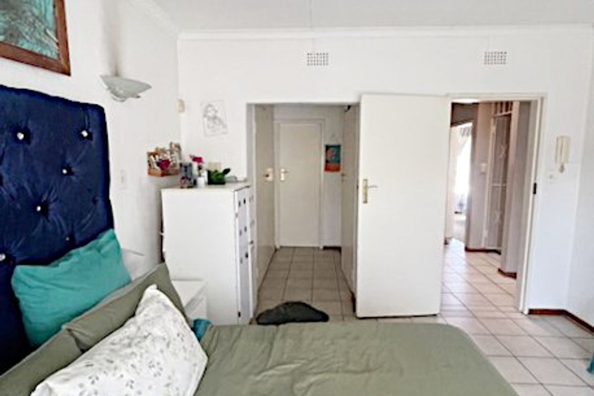 Spacious Duplex Living in a Secure Boomed-Off Area!  - Photo 3