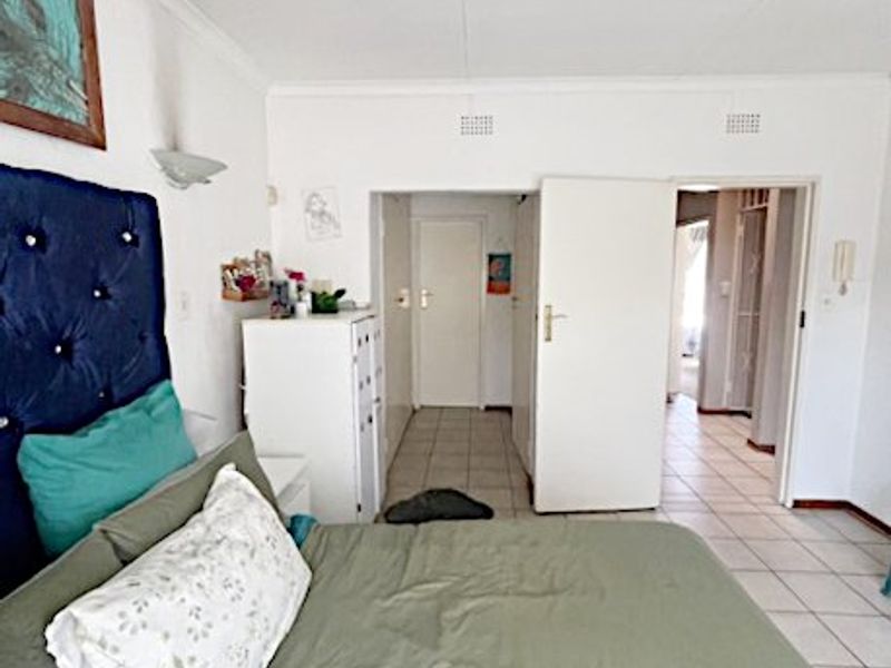 Spacious Duplex Living in a Secure Boomed-Off Area!  - Photo 3
