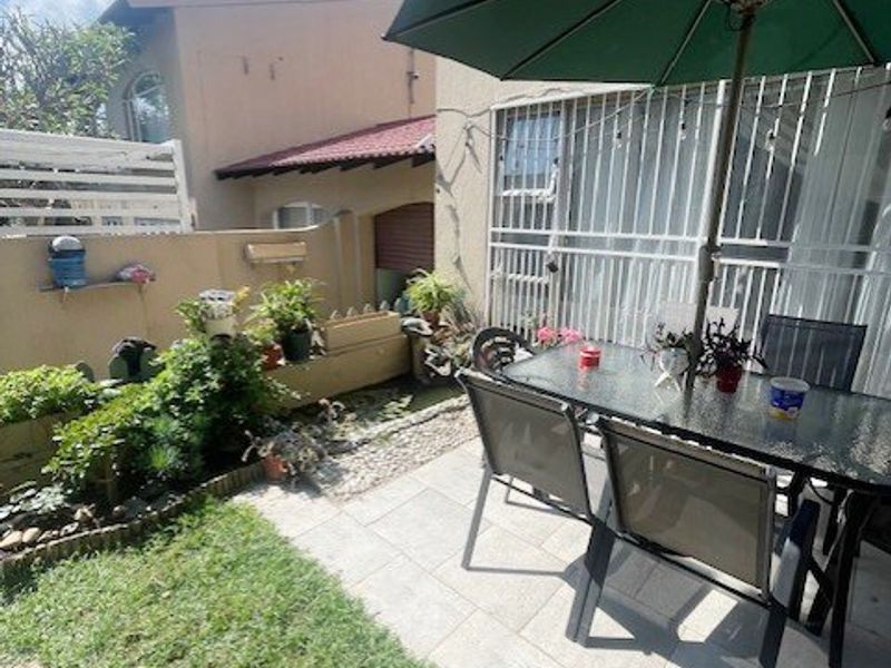 Spacious Duplex Living in a Secure Boomed-Off Area!  - Photo 1