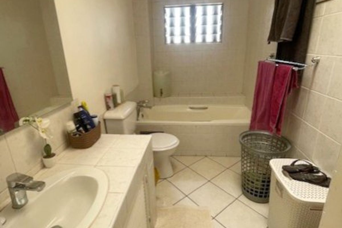 Spacious Duplex Living in a Secure Boomed-Off Area!  - Photo 2