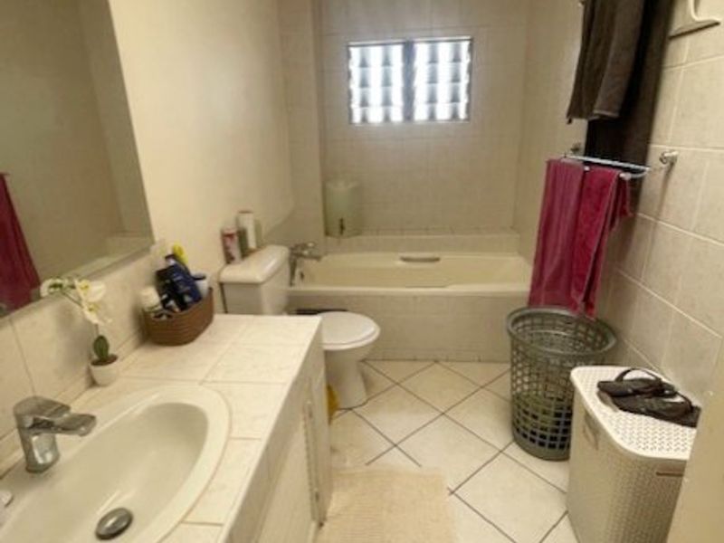 Spacious Duplex Living in a Secure Boomed-Off Area!  - Photo 2