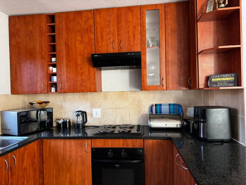 Stylish 2 Bed Townhouse in Rooihuiskraal North - Photo 5