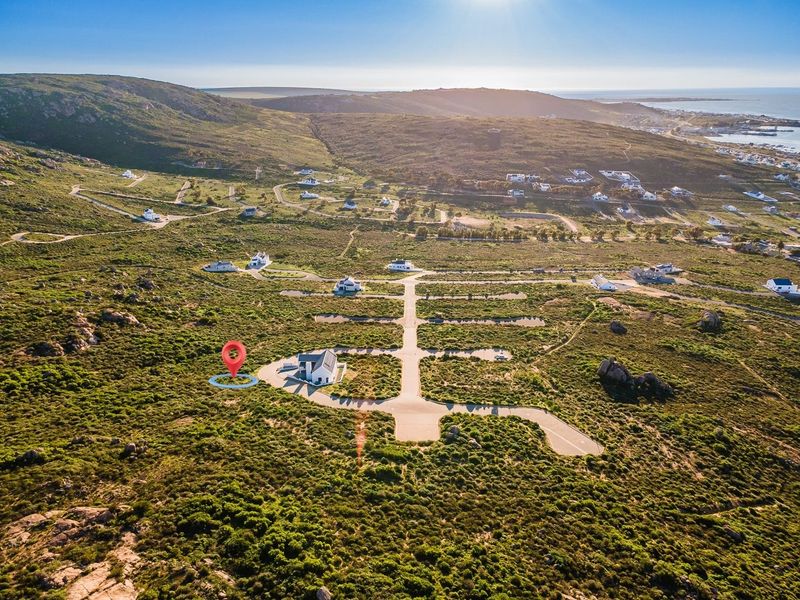 Embrace a peaceful coastal retirement surrounded by pristine fynbos, calm ocean bays, and a secure community designed for your finest chapter yet. - Photo 1