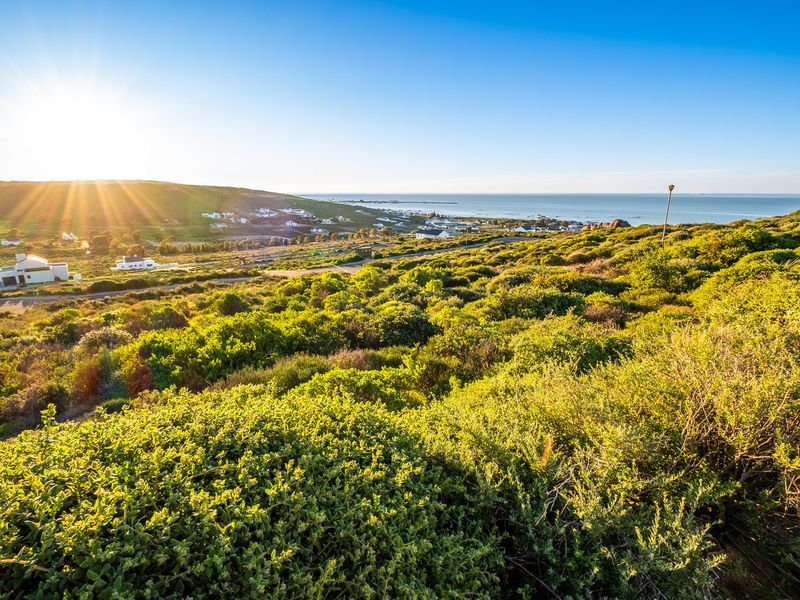 Embrace a peaceful coastal retirement surrounded by pristine fynbos, calm ocean bays, and a secure community designed for your finest chapter yet. - Photo 5
