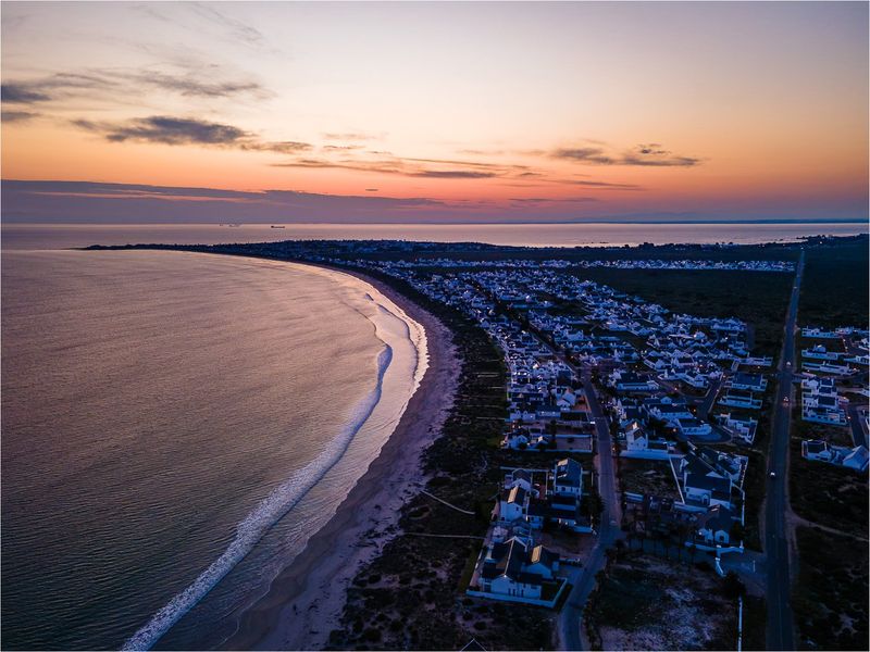 Embrace a peaceful coastal retirement surrounded by pristine fynbos, calm ocean bays, and a secure community designed for your finest chapter yet. - Photo 7