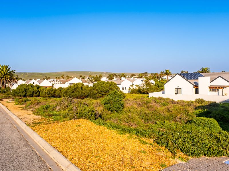Embrace a peaceful coastal retirement surrounded by pristine fynbos, calm ocean bays, and a secure community designed for your finest chapter yet. - Photo 3
