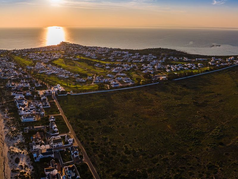 Embrace a peaceful coastal retirement surrounded by pristine fynbos, calm ocean bays, and a secure community designed for your finest chapter yet. - Photo 9