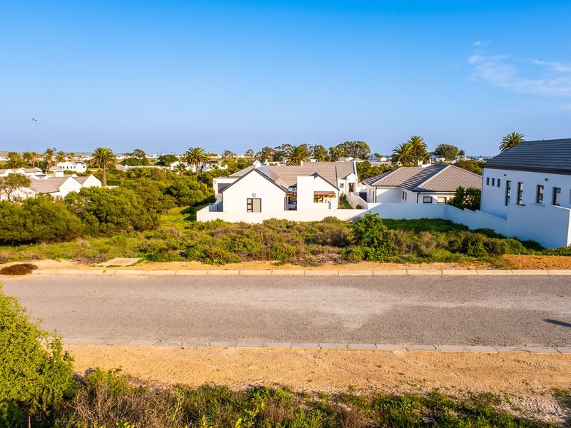 Embrace a peaceful coastal retirement surrounded by pristine fynbos, calm ocean bays, and a secure community designed for your finest chapter yet. - Photo 4