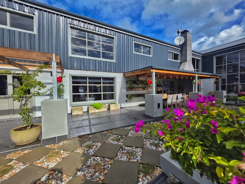 Stylish & Unique Modern home with income generating potential  - Photo 1