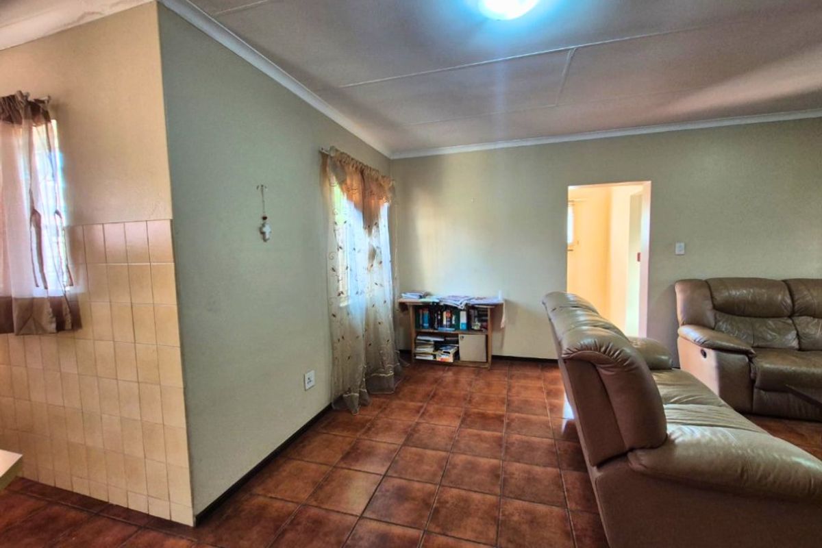Secure Living with Exceptional Renovation Potential – No Levies - Photo 4
