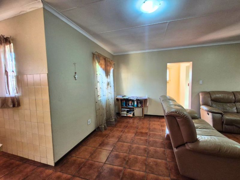 Secure Living with Exceptional Renovation Potential – No Levies - Photo 4
