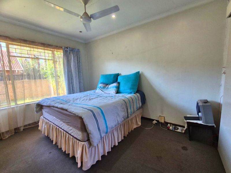 Secure Living with Exceptional Renovation Potential – No Levies - Photo 8