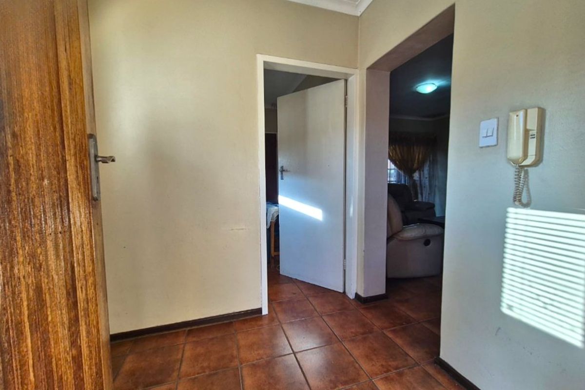 Secure Living with Exceptional Renovation Potential – No Levies - Photo 2